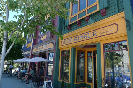 Sidewalk Cafe - stores, colour, shades, summer, sidewalk, windows, cafe, umbrellas