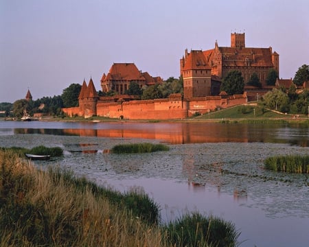 Malbork Castle Poland - sky, castle, water, brick