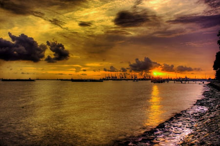 Another beautiful sunset - yellow, silence, amazing, beach, sunsets, reflection, shore, view, golden, sky, sun, clouds, water, image, beautiful, beauty, gold, glow, another, glowing, nature, tranquility, picture, background