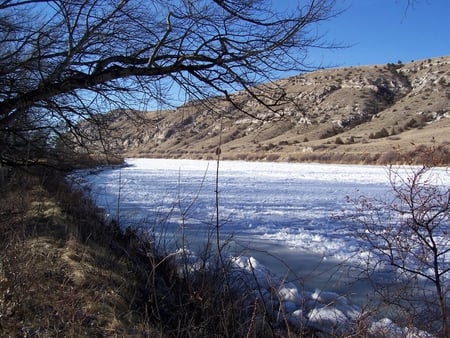 Missouri River Spring Ice Breakup - ice, hillside, trees, river, water