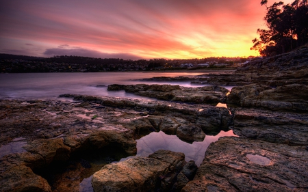 slippery_when_wet - sun, wet, colorful, sunset, rocks, nature, view, yellow, beautiful, pink, clouds, tree