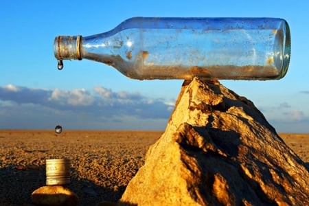 Last Drops - sky, drops, desert, stone, bottle, abstract