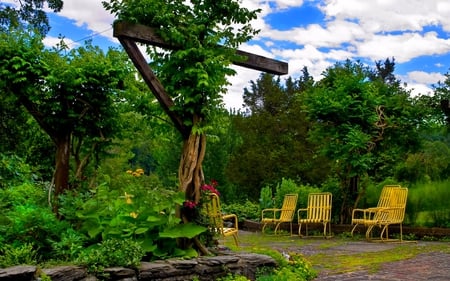 GREEN GARDEN - blossoms, garden, plants, yellow chairs, green