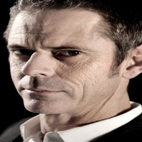 C.THOMAS HOWELL