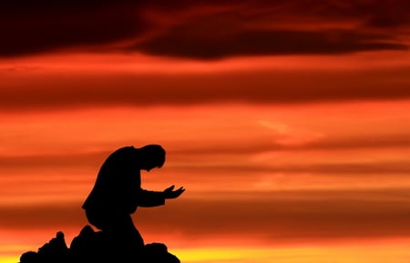 Prayers for those facing Hurricane Irene - sky, hope, orange, kneeling, mankind, black, prayers