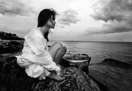 Thinking About You - beauty, woman, ocean, girl, photography, water, black and white, black, model, rocks, white, grey, clouds, beautiful