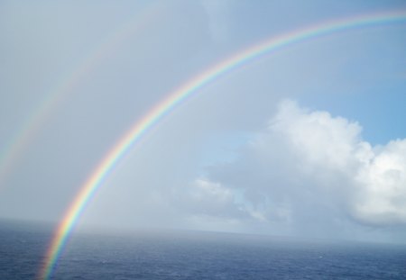 Rainbows on the Ocean  - clouds, white, nature, blue, red, photography, rainbows, sky