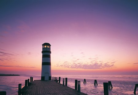 lighthouse at dusk - pretty, manmade, water, lighthouse, beach, photography, sea, ocean, pink, structure, black, white, sunset