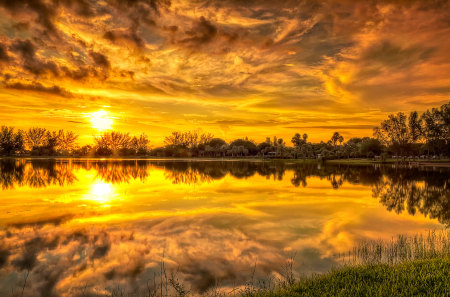 Lovely Sunset - yellow, amazing, splendor, landscape, grass, reflection, golden sunset, view, lake, golden, houses, sky, clouds, house, trees, water, beautiful, beauty, colors, lovely, tree, nature, sunset, clear, peaceful