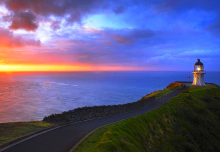 LIGHTHOUSE at SUNSET - sunset, lighthouse, road, ocean, mountain