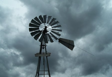 The Old Windmill - water, stormy, farm, cloudy, windmill, sky