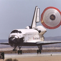 Space Shuttle Landing with Parachute