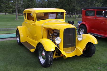 Ford 1931 yellow in Radium Hot Springs car show 2 - trees, yellow, tire, Engine, Photography, Headlights, nickel, Ford, red, green, old