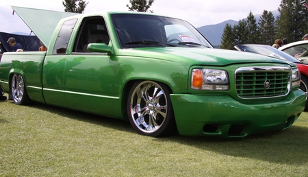 Dodge truck at the Radium Hot Springs car show 9 - headlights, red, dodge, tires, grass, photography, truck, trees, green