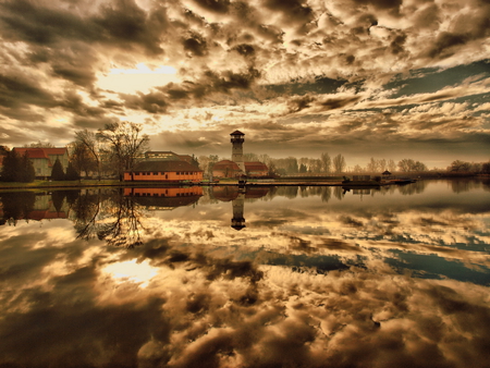 Calm on the Lake - sky, lighthouse, lake, reflection, clouds, mirror, light, house