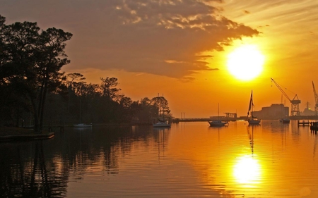 Boats-at-sunset - boats, trees, sunset, nature, yellow, beach, reflection, sky