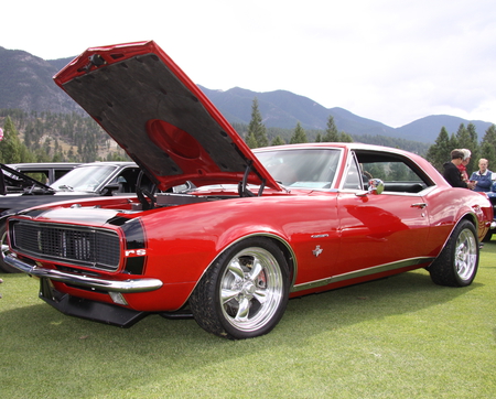 Chevrolet Camaro in Radium Hot Springs car show 26  - nickel, chevrolet, trees, camaro, mountains, black, white, silver, car, red, clouds, tire, green