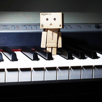 Danbo play trampoline on piano