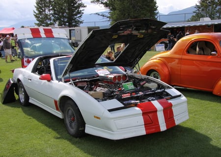 Pontiac 1984 in Radium Hot Springs car show 61 - red, mountains, tent, white, car, photography, gmc, orange, trees, pontiac, green