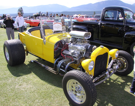 Ford 1926 at the Radium Hot Springs car show 70 - headlights, red, silver, mountains, chrome, yellow, tire, ford, nickel, engine, belt, photography, green