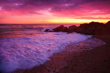 Sunset - amazing, beach, splendor, pink, sand, purple, view, sky, clouds, beautiful, sea, beauty, colors, lovely, ocean, stones, colorful, nature, sunset, waves, peaceful, rocks