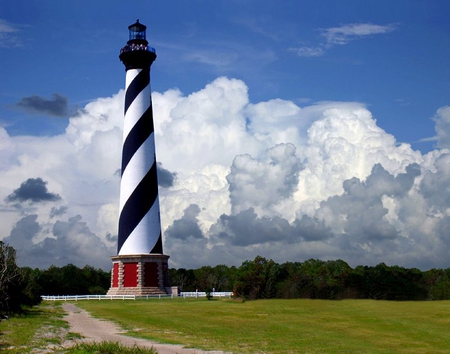 Striped Lighthouse - sky, lighthouse, grass, clouds