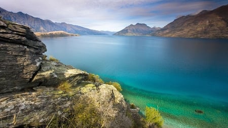 Our World Beauties - clouds, hills, scenery, blue, beautiful, photography, stones, mounts, nature, view, lake, mountains, sky