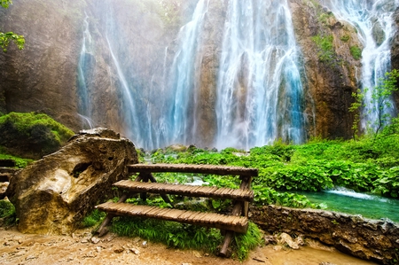 Take a Rest, Please - beauty, branches, mounts, water, bench, mountains, waterfall, nature, view, river, beautiful, scenery, green, stones