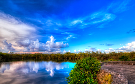 Blue Sky - beauty, sky, paradise, magic, peaceful, water, playground, colorful, blue sky, view, reflection, clouds, green, grass, lake, landscape, lovely, nature, blue, beautiful, splendor, colors