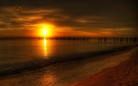 Golden Sunset - beauty, sky, beach, ocean waves, golden sunset, peaceful, sun, sunset, golden sunset over water, amazing, view, reflection, clouds, golden, sunrays, sand, rays, ocean, lake, sunlight, shore, lovely, waves, nature, beautiful, splendor, sea, line