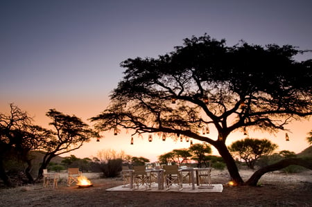 Beautiful evening - safari, great, sunset, fire, amazing, relaxation, lanterns, cool, table, romance, holiday, food, place, africa, nature, romantic, beautiful, nice, beauty, sky, trees, peaceful, photography, candles, vacation, calm, pretty, dinner, relax, lovely, luxury, savanna, drinks