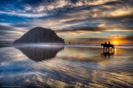 Riding On The Beach - clouds, beach, sea, ocean, reflection, man, wonderful, sunset, nature, woman, ride, sky