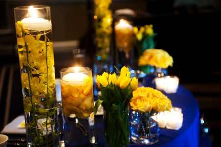 The one I say good night to... - roses, yellow, the one, fashion, entertainment, light, faith, good night, candles, centerpiece, special, beautiful, table, friendship, believe, deep blue, love, bouquet, wonder, wonderful, tulips, sweetheart, floral