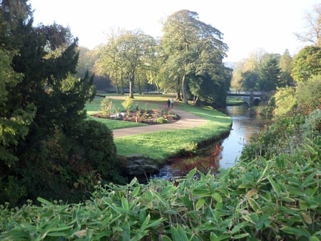 day Walk though Buxton Park - trees, river, flower beds, river bank, bushers