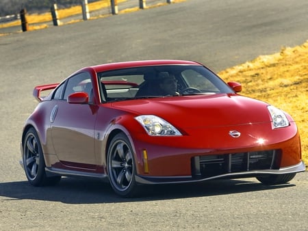 nissan 350z - two seater, black alloys, front engine, red