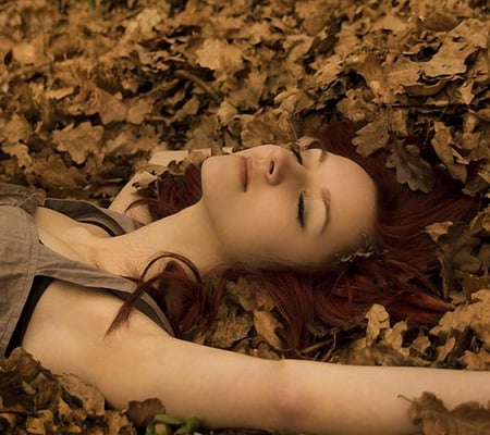 Listen to the sound of the earth..... - red hair, listening, cute, ground, beautiful, leaves, girl, autumn