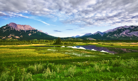 Valley Dream - sky, valley, mountians, clouds, field, grass