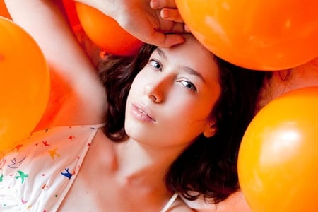 Pretty girl with balloons - pretty, laying, female, balloons, face, orange