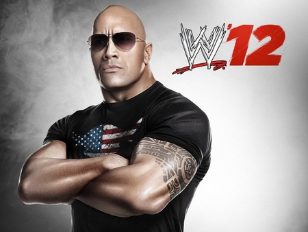 the rock - blacl t shirt, tattoo, shaved head, sunglasses, wwe