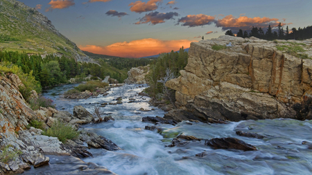 Sunset Montana - clouds, trees, branches, scenery, beautiful, beauty, stones, river, sunset, mounts, nature, view, mountains, sun, sky