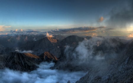 Misty Clouds Over Mountains - misty, clouds, mountain tops, dark blue