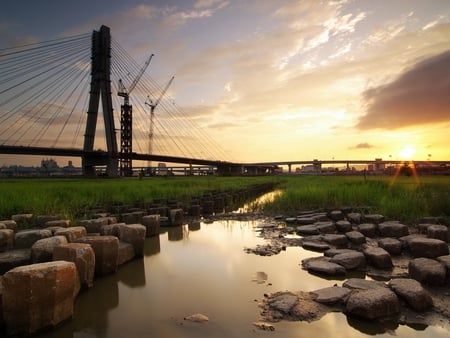 unfinished-bridge - clouds, scenery, beautiful, landscape, stones, river, sunset, nature, view, sky, bridge