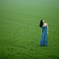 Lovely girl and fresh green grass