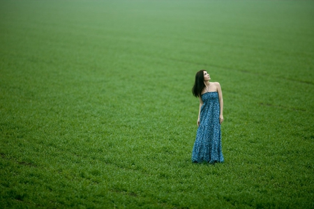 Lovely girl and fresh green grass - blue dress, beauty, grass, lovely girl, wonderful, nature, green, field, green grass, beautiful day