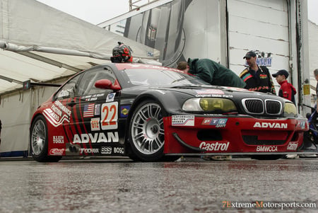 bmw race car - silver alloys, people, two seater, race modified, black, red, helmet, sponsorship, front engine