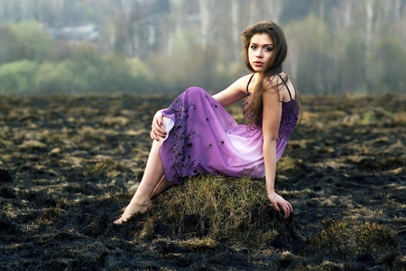 Lovely girl in purple - face, cute, ground, sweet, lovely girl, eyes, beaty, purple dress, field, trees, hair, stare, nature