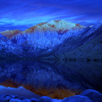 Mountains reflected over the water