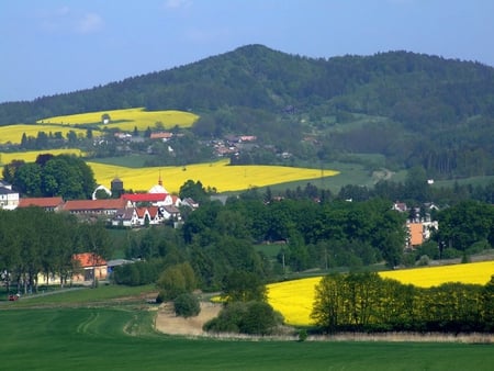 Valley a Glow - village, sky, yellow, plants