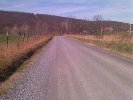 Road to the Allegheney Mtns. - red, barn, road, gravel, mountains, fence