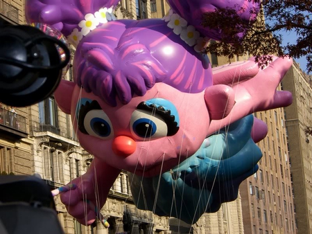 Macy's Day Parade - balloon, girl, buildings, parade